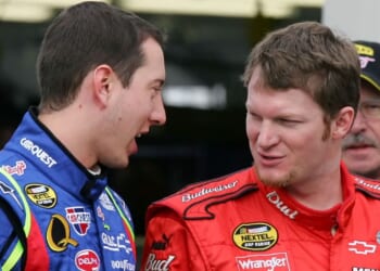 Driver Kyle Busch talks to driver Dale Earnhardt Jr. in the garage during NASCAR testing at Las Vegas Motor Speedway on Jan. 30, 2007 in Las Vegas.