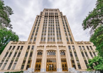 A low-angle view of Atlanta City Hall in Fulton County, Georgia.