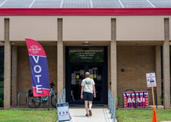 A person prepares to vote at the South Austin Recreation Center on May 26, 2026, in Austin, Texas.