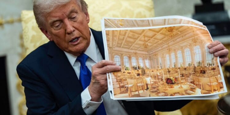 President Trump displays artists’ renderings of the new East Wing ballroom on October 22, 2025.
