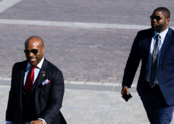 Rep. Wesley Hunt, R-Texas, left, and Rep. Byron Donalds, R-Fla., walk up the House steps at the Capitol.