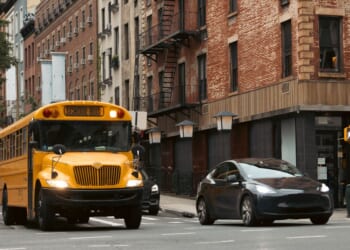 A typical yellow school bus in New York City in Midtown Manhattan.