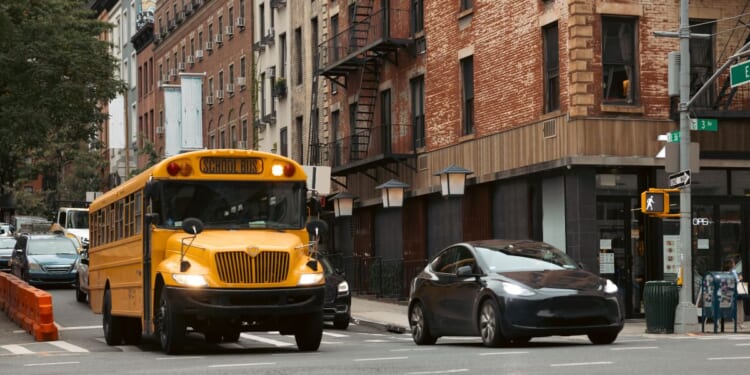 A typical yellow school bus in New York City in Midtown Manhattan.