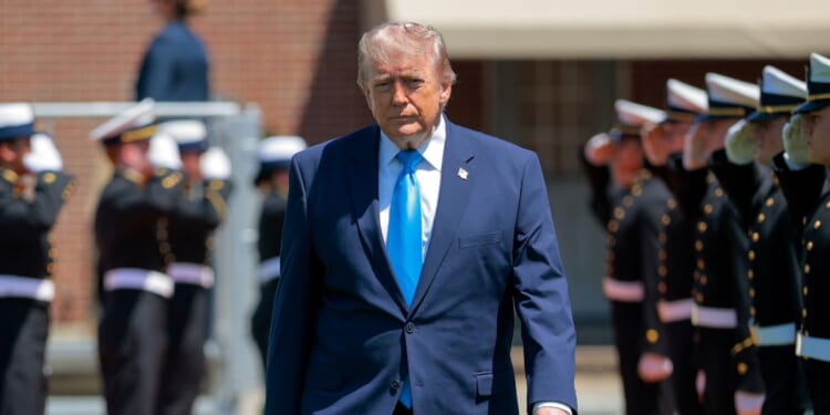 President Donald Trump arrives at a commencement ceremony on Cadet Memorial Field at the United States Coast Guard Academy in New London, Connecticut, on May 20, 2026.