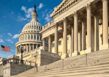 A view of the east facade of the US Capitol basking in the early morning sun.