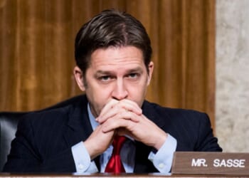 Former Senator Bill Sasse sits in the Senate Armed Services Committee room on January 12, 2017.