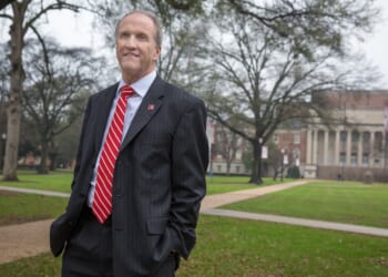 Stuart R. Bell, former president of the University of Alabama, walks on the quad in Tuscaloosa.