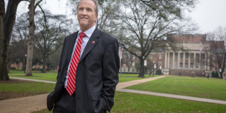 Stuart R. Bell, former president of the University of Alabama, walks on the quad in Tuscaloosa.