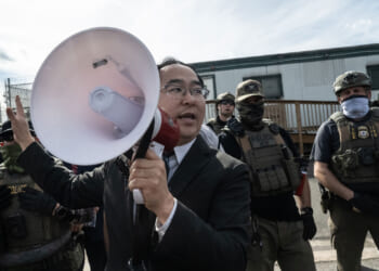 U.S. Sen. Andy Kim (D-NJ) tries to broker a de-escalation between ICE agents and immigration activists outside of Delaney Hall on May 25, Memorial Day in Newark, New Jersey. Activists had come to support immigrants detained at the Delaney Hall who are participating in an inmate hunger strike over detention conditions as the strike continued into the fourth day. (Photo by Stephanie Keith/Getty Images)