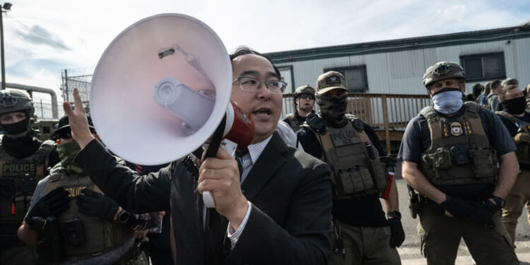U.S. Sen. Andy Kim (D-NJ) tries to broker a de-escalation between ICE agents and immigration activists outside of Delaney Hall on May 25, Memorial Day in Newark, New Jersey. Activists had come to support immigrants detained at the Delaney Hall who are participating in an inmate hunger strike over detention conditions as the strike continued into the fourth day. (Photo by Stephanie Keith/Getty Images)