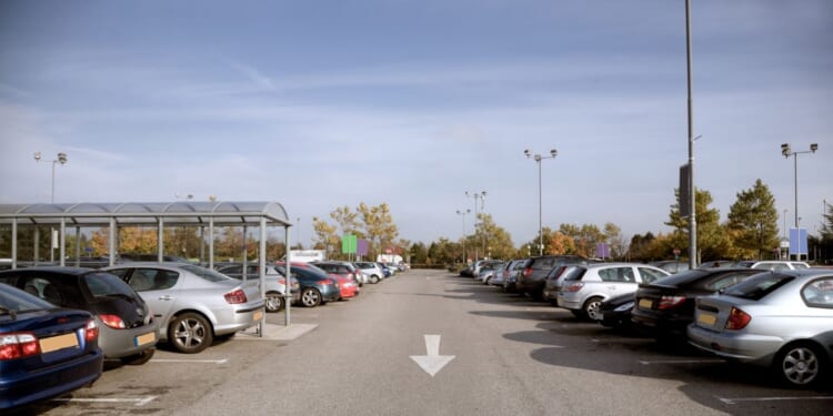 Cars in a shopping center.