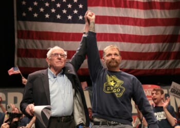 Sen. Bernie Sanders and Democratic U.S. Senate candidate Graham Platner stand together during a “Fighting Oligarchy” tour stop at the Collins Center for the Arts on the University of Maine campus on May 24, 2026, in Orono, Maine.
