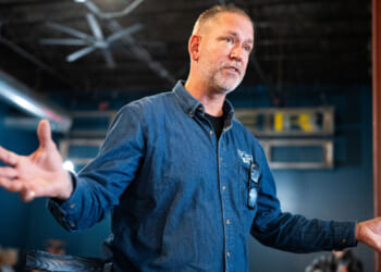 Dan Osborn speaks to supporters at a rally in Nebraska.