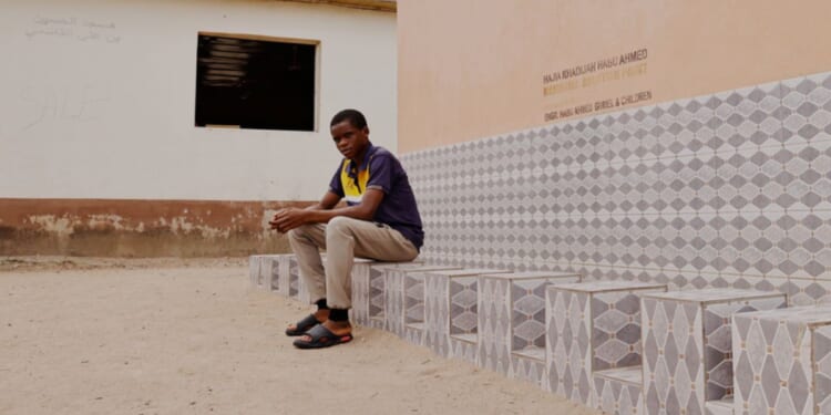 A student from an orphanage school who was abducted with others by gunmen in late April, is photographed May 7 following his release in Lokoja, Nigeria. Attacks on schools continued last week, with more than 80 children abducted.