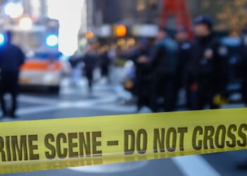 A crime scene with police tape.