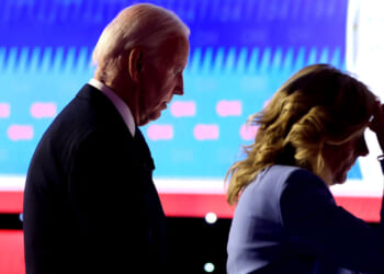 President Joe Biden walks off with first lady Jill Biden following the CNN Presidential Debate at the CNN Studios on June 27, 2024 in Atlanta, Georgia. (Photo by Justin Sullivan/Getty Images)