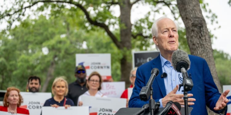 Sen. John Cornyn speaks during a news conference after casting his vote during early voting in the primary runoff at the Circle C Community Center on May 18, 2026, in Austin, Texas.