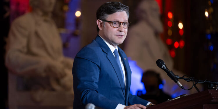 US Speaker of the House Mike Johnson, Republican from Louisiana, speaks during the National Day of Prayer service in Statuary Hall at the US Capitol in Washington, DC, on May 7, 2026.