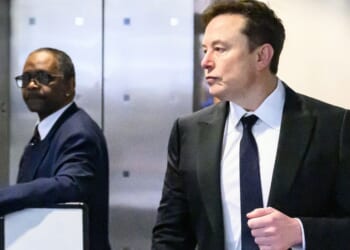 Elon Musk arrives at the federal courthouse in Oakland, California, April 28 during proceedings in the trial over his lawsuit against OpenAI.