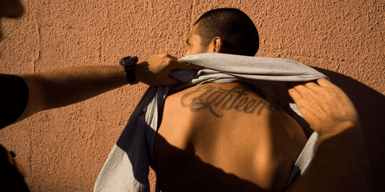 An 18th street gang member is being arrested.