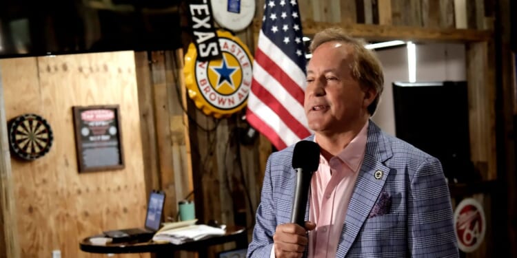Republican Senate candidate Ken Paxton speaks to supporters at a campaign stop on May 15, 2026, in Little Elm, Texas.