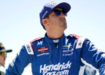 Kyle Busch, driver of the HendrickCars.com Chevrolet, looks on during practice for the NASCAR Craftsman Truck Series ECOSAVE 200 at Dover Motor Speedway on May 15, 2026, in Dover, Delaware.
