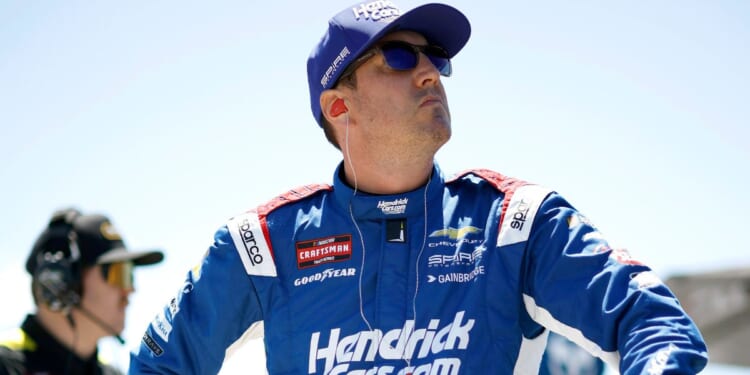 Kyle Busch, driver of the HendrickCars.com Chevrolet, looks on during practice for the NASCAR Craftsman Truck Series ECOSAVE 200 at Dover Motor Speedway on May 15, 2026, in Dover, Delaware.