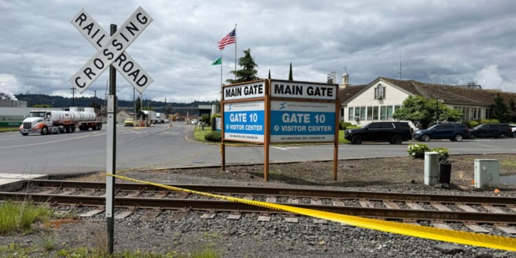 The exterior of the Nippon Dynawave Packaging Co. is shown, after a tank containing hazardous liquid imploded Tuesday in Longview, Washington.