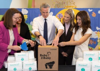 Elizabeth Landsberg, Kim Johnson, Gavin Newsom, Kelly Sawyer Patricof, and Norah Weinstein fill diaper boxes at the Baby2Baby x Golden State Start event at Children’s Creativity Museum on May 8, 2026, in San Francisco, California.