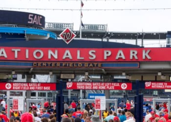 The fans walking into an early morning baseball game between the Nationals and the Mets on July 4, 2017, in Washington, D.C.