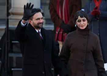 New York City Mayor Zohran Mamdani waves next to his wife Rama Duwaji during his public inauguration ceremony followed by a block party at City Hall in New York on Jan. 1, 2026.