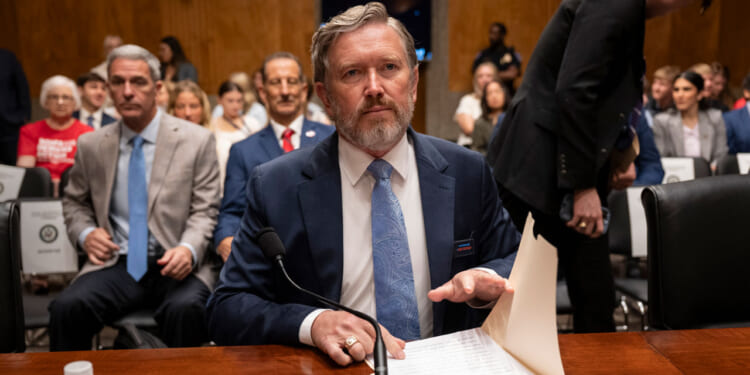 Thomas Massie (R-KY) prepares to testify during the Senate Homeland Security and Governmental Affairs Committee Second Amendment hearing in the Dirksen Senate Office Building.