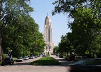 The Nebraska State Capitol can be seen in the sunlight on May 14, 2024.