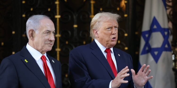 President Donald Trump welcomes Israeli Prime Minister Benjamin Netanyahu to his Mar-a-Lago club on Dec. 29, 2025, in Palm Beach, Florida.