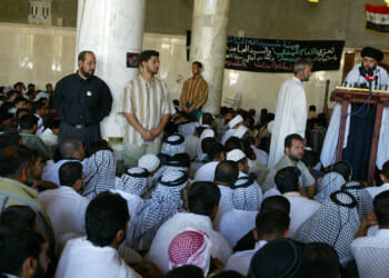 Radical Shiite cleric Moqtada al-Sadr gives a speech during the Friday noon prayers in the central mosque of Kufa.