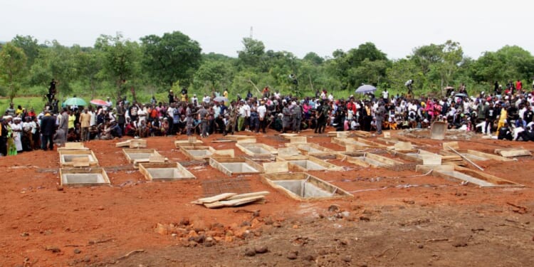 The graves of 17 Christian worshippers and two priests at a funeral service in the Gwer East district of Benue State, Nigeria on May 22, 2018.