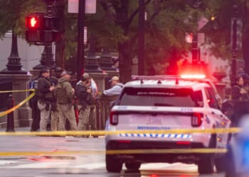 Emergency teams work the scene after multiple gunshots ring out outside the White House on May 23, 2026, in Washington, D.C.