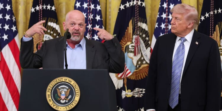 Las Vegas pawn shop owner and reality television actor Rick Harrison joins President Donald Trump during a small business summit in the East Room of the White House on May 4, 2026, in Washington, D.C.