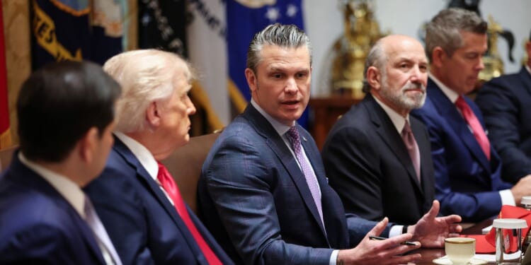 Secretary of War Pete Hegseth speaks as Secretary of State Marco Rubio, President Donald Trump, Commerce Secretary Howard Lutnick, and Transportation Secretary Sean Duffy listen during a Cabinet meeting in the Cabinet Room of the White House on May 27, 2026, in Washington, D.C.