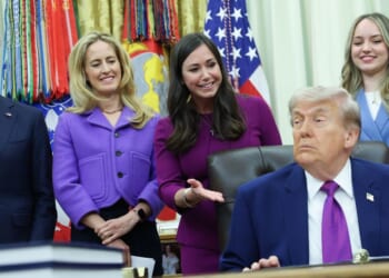 President Donald Trump listens as Sen. Katie Britt delivers remarks during an event on maternal healthcare in the Oval Office of the White House on May 11, 2026, in Washington, D.C.