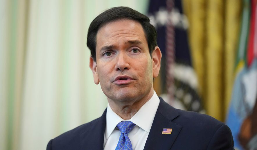 Secretary of State Marco Rubio speaks during a meeting between the ambassadors of Israel and Lebanon in the Oval Office at the White House, Thursday, April 23, 2026, in Washington. (AP Photo/Mark Schiefelbein)