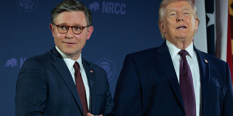 Speaker of the House Mike Johnson and President Donald Trump at an NRCC event.