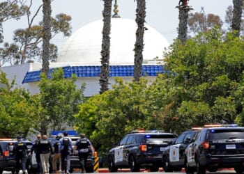 Law enforcement officers surround the Islamic Center of San Diego after reports of a shooting.