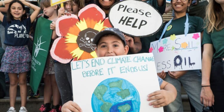 Students in New York take part in the 2019 Climate Strike, part of a worldwide day of climate strikes on Sept. 20, 2019. A whole generation of kids grew up under prophecies of doom based on a climate model that was never feasible, but is only now being discarded.