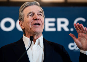 Roy Cooper speaks at a campaign event.