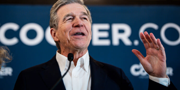Roy Cooper speaks at a campaign event.