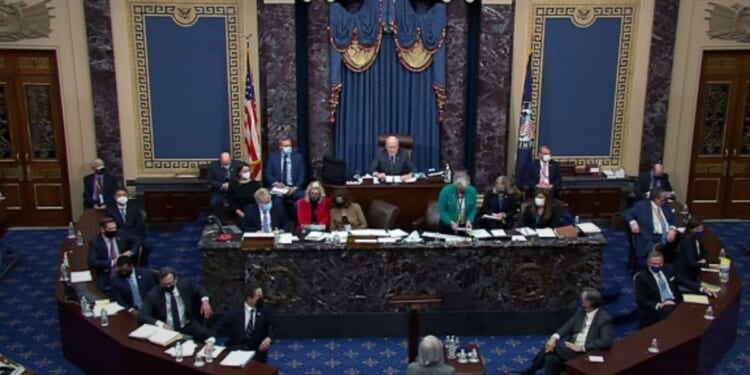Senators fill the chamber on February 13, 2021 in Washington, D.C.