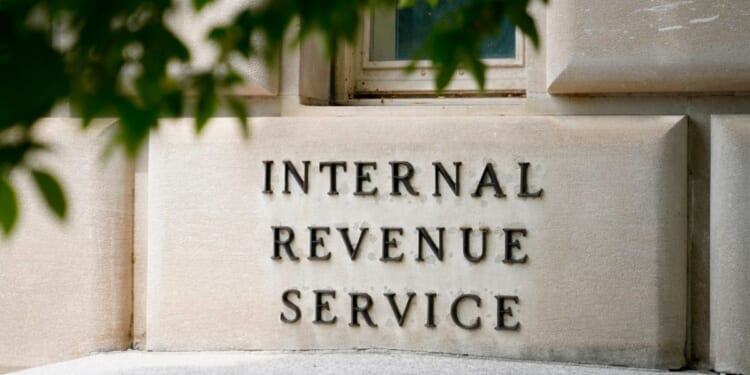 Internal Revenue Service lettering can be viewed on a brick on the IRS Headquarters on May 4, 2021.