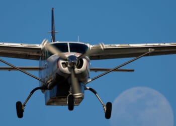 A FedEx Cessna Super Cargomaster airplane flies to San Diego International Airport in San Diego on May 9, 2025.