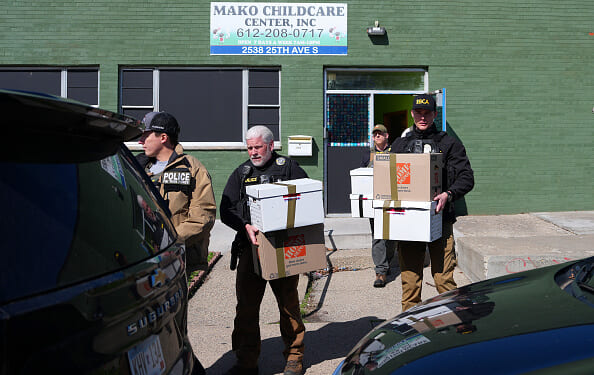 Federal agents remove documents from a childcare center in South Minneapolis.
